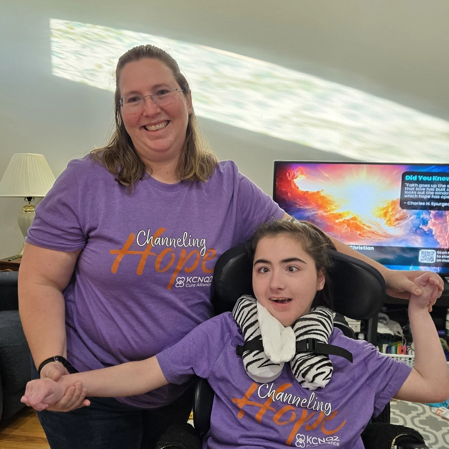 Mom and daughter wearing KCNQ2 awareness shirts
